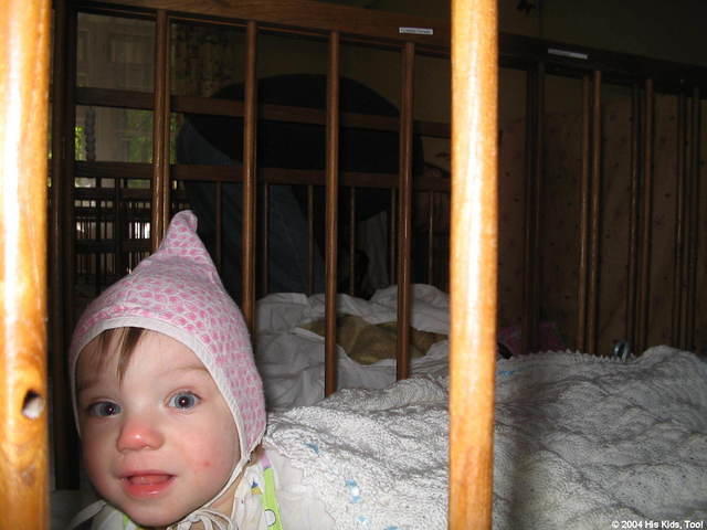 This little one is cute as can be with their new warm hat, and beautiful blanket.