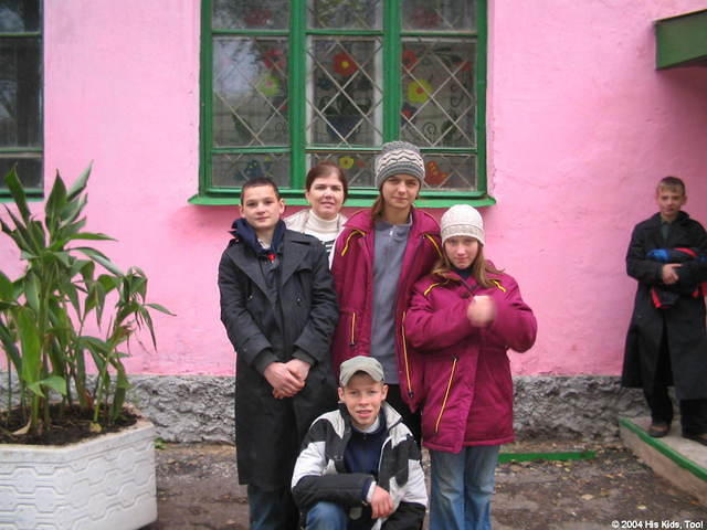 This group of teens helped carry boxes, and insisted on a photo.