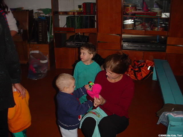 The children were so excited, they didn't want to take off their old clothes, but just put the new over them.
