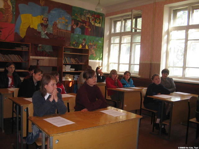 The young ladies listen attentively.