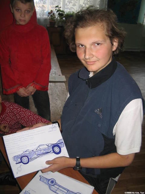 Alex, a talented artist, spoke english, and we subsequently offered him new art supplies.