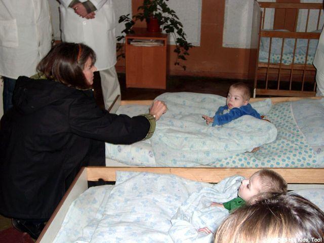 Peggy reaches out to this child with cookies.