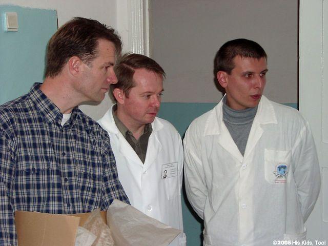 Ray, fluent in Russian, converses with the Dr.'s about different children.