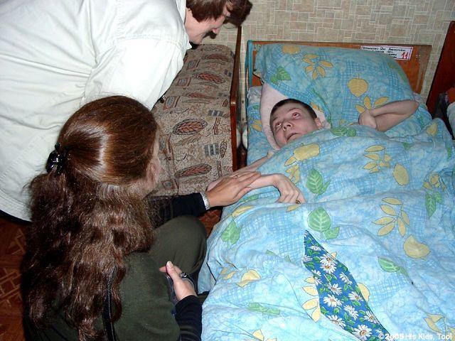 Three of the ladies are completely bed ridden.  Here, Teresa spends some time with this 22yr. old woman.