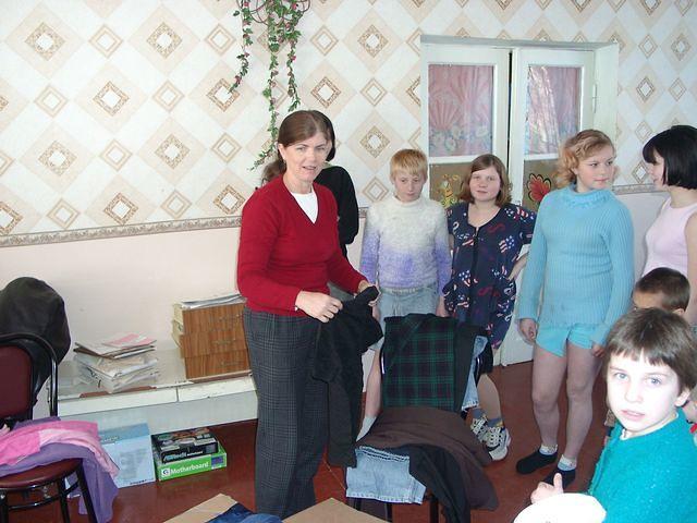 The young girls are excited about their new clothes.