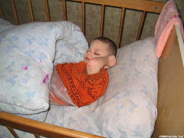 Some children are wrapped in plastic.