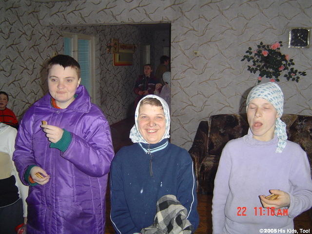 The young girl in the purple coat was bedridden at our last visit, so it was wonderful to see her up and around.
