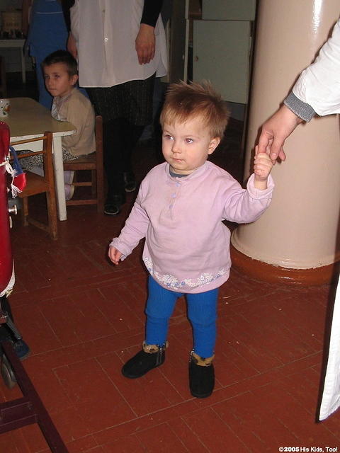 This little girl is walking on her own.