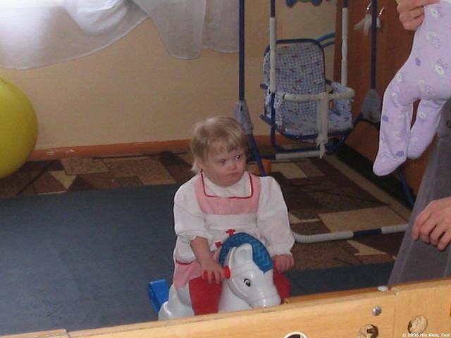 This sweet girl enjoys a pony ride.