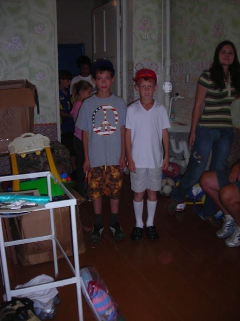 Two kids were so happy with their clothes, they ran and changed and came back to show us.