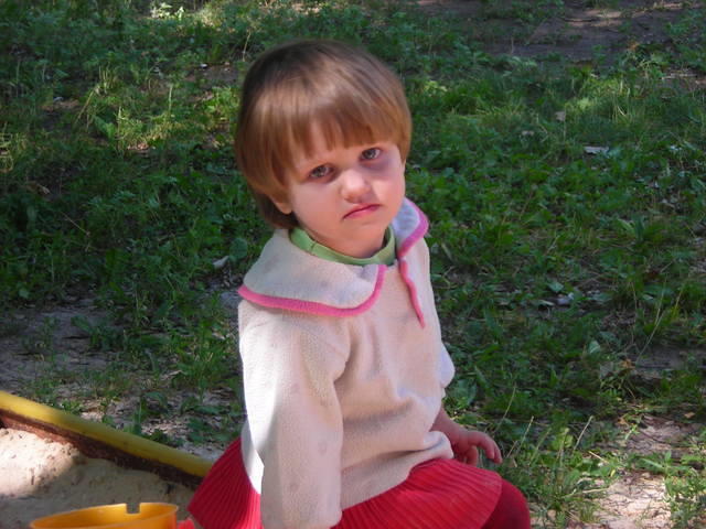 This precious girl waits for her hug...and she does get several!