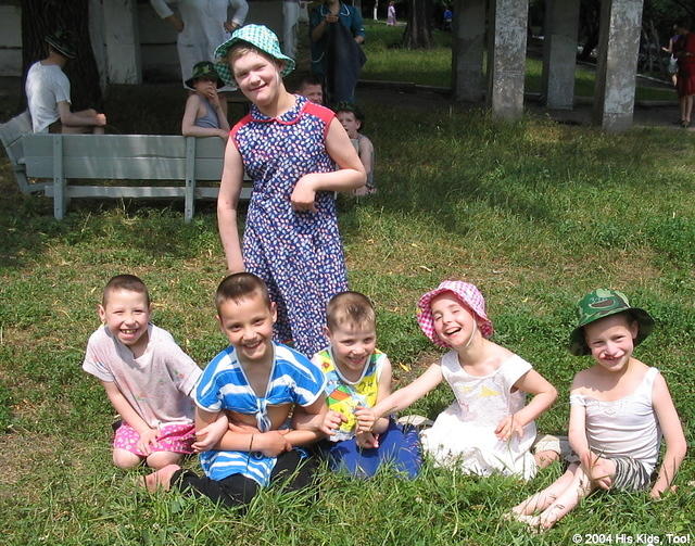 Here, other children joined together to form a group that wanted with photo taken.