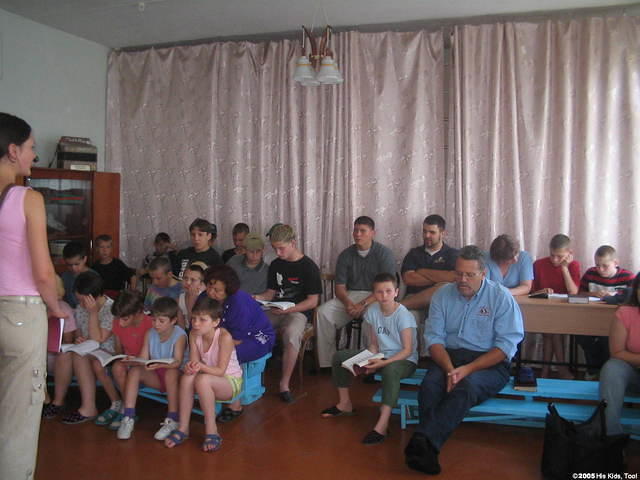 Kids follow along in their Bibles.
