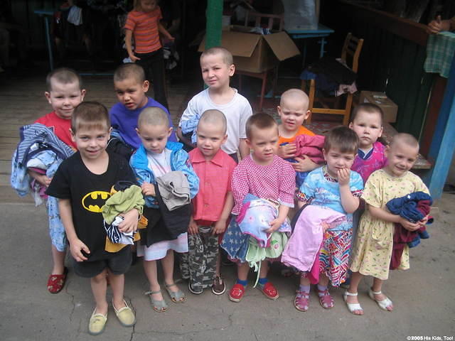 With their new clothes.  One boy just loved the 'Batman' shirt, he had to put it on immediately.