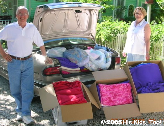 Ron and Mary D. of South Trail Church of Christ deliver over 150 blankets, clothing, toys and shoes to be shipped to Ukraine for