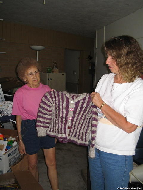 Ellen shows Frieda some of her handiwork.