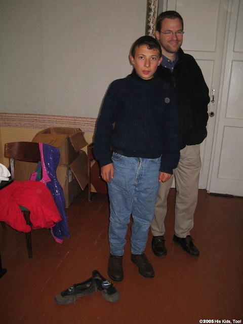 Dave D.(Woodbury CoC) was working with finding shoes to fit the children.