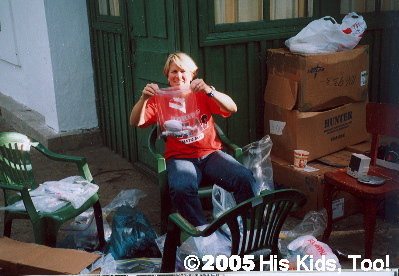 Karen B. puts together toiletry bags for teens. Summer 2005 in Ukraine.