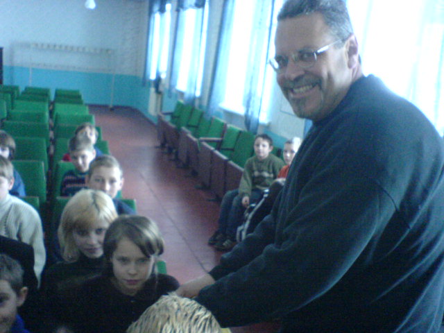 Rich greets the children.