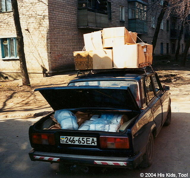 You may get around town by any number of means of transportation.  Here is a Lada.  A small 'boxy' 5 passenger car.