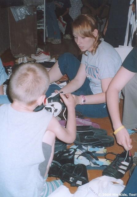 Ashley continues to work on shoes.