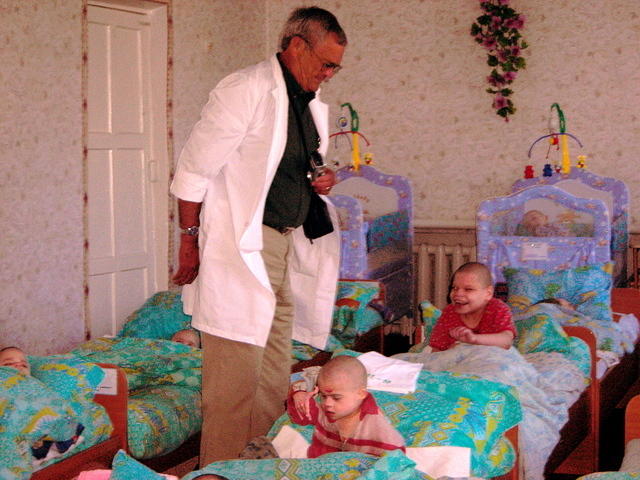 Walter makes a point to visit with each child.
