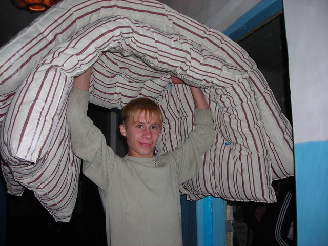 Everyone got invloved carrying in the 180 new mattresses.