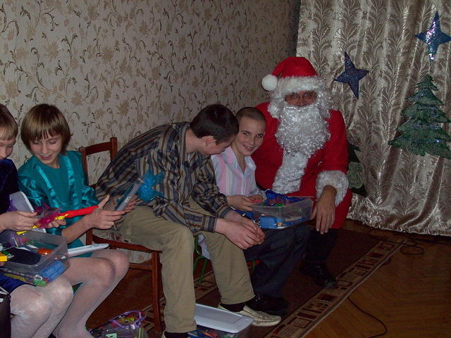 The older teens talk with Santa.