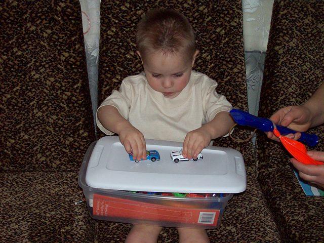 This little girl thought that the box was the gift...