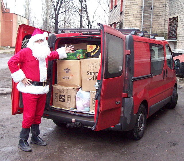 ...and then...Santa appeared with the loaded van.
