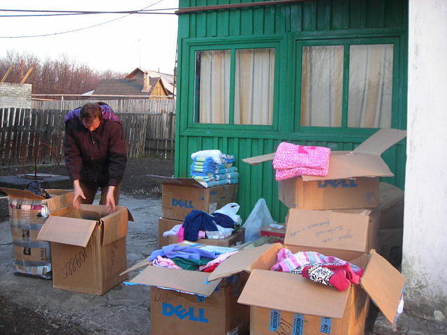 Before distribution, boxes are sorted by clothing sizes, and facility needs.