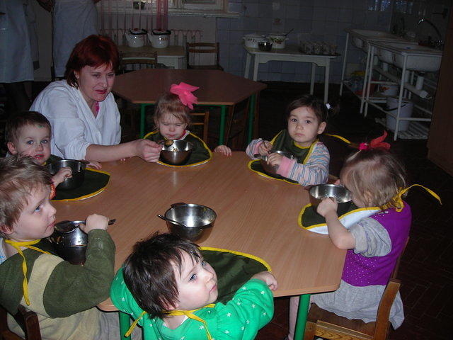 Children enjoy their food.