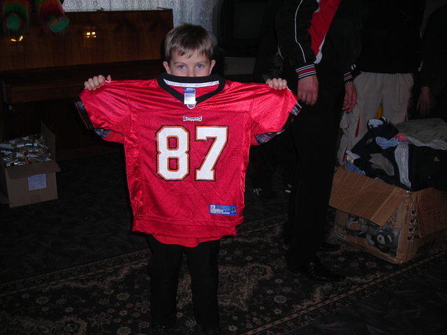 This boy was VERY pleased with his new Tampa Bay Bucaneer jersey.