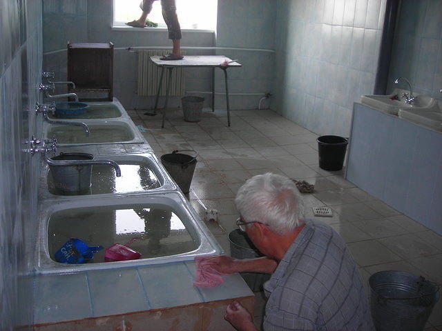 ...workers are completing the tile work.