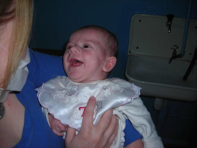 Sundy makes this boy laugh.