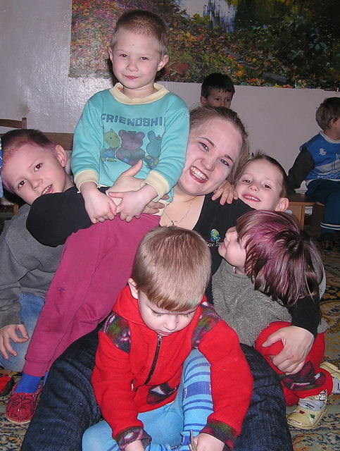 Christine has fun with the kids.