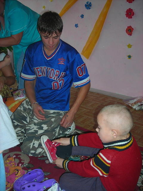 Sergey helped with shoes for the little ones.