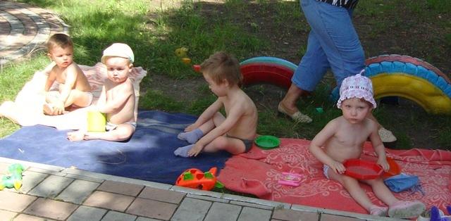 It was a hot day, and kids enjoyed playing outside.