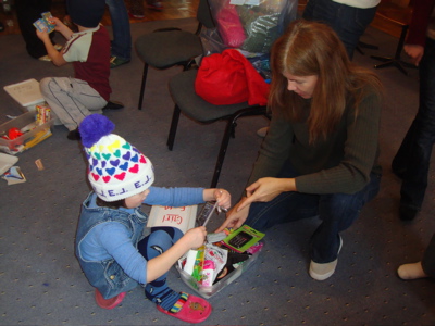 Teresa helps explain some of the box gifts.