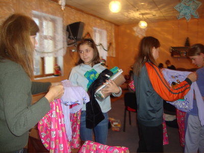 Teen girls receive Scooby Doo p.j.'s thanks to Glendale Rd. Church of Christ.