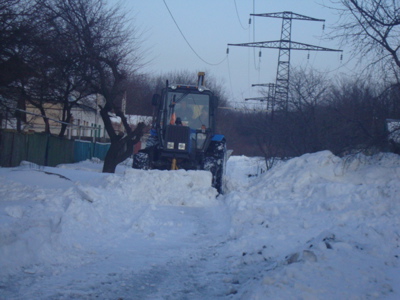 When we arrived in Dzerzhinsk, we found that our road had not been plowed at all, so we found a plow and paid him to plow our ro