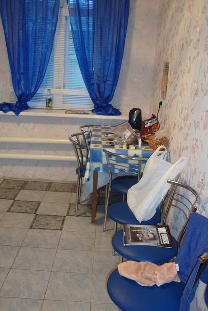 curtains, kitchen table, chairs