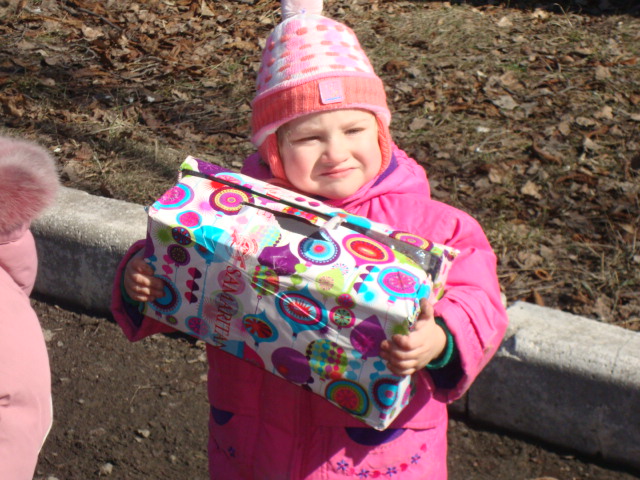The box was almost as big as she!