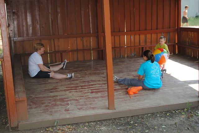 Linda and Susanna play ball with little Dima.