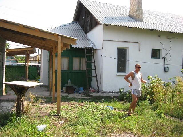 Ajoining house, not touched by fire.
