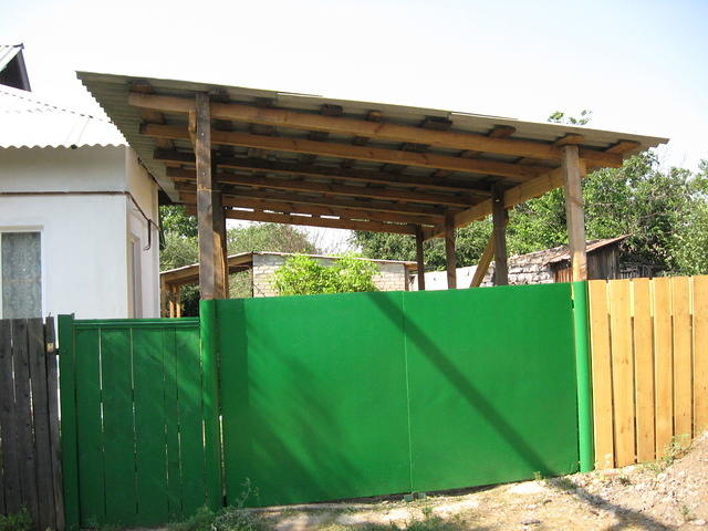 welded gate, new carport, and new paint