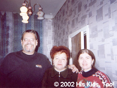 His Kids, Too! Director Teresa Fillmon, and Assistant Director Rich Fillmon, pose with their friend and local Internot Director.