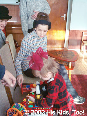 Alla playing with toys with her 'new' sister, Haley