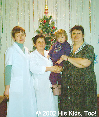 Alla and her caregivers (from rt. to left), Natalia, Vala, and Oksana.