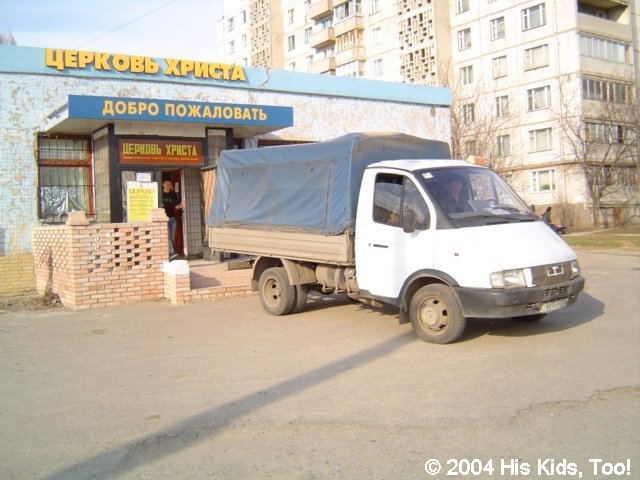 Products are unloaded at the church building and packaged for distribution